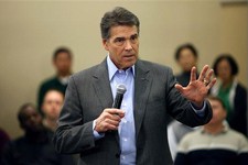 Romney automated calls assail Perry in Iowa - Politics & Elections ...