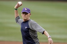  - 
              Political consultant James Carville throws out an honorary first pitch before a baseball game between the Washington Nationals and the Atlanta Braves at Nationals Park on Tuesday, Aug. 
