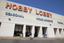  - 
              FILE - In this Sept. 12, 2012 file photo, a woman walks from a Hobby Lobby Inc., store in Little Rock, Ark. Hobby Lobby Stores, the arts and craft supply chain that wants to block enfor