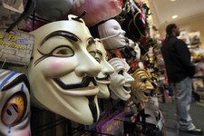  - 
              FILE - In this Oct. 21, 2011 file photo, masks, including "V for Vendetta," left, are displayed at a Ricky's Halloween store in New York. Television audiences across China watched an an