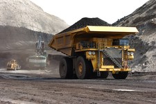  - 
              In this April 4, 2013 photo, a truck carrying 250 tons of coal hauls the fuel to the surface of the Spring Creek mine near Decker, Mont.  From the time coal is blasted from strip mines 