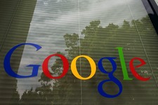  - 
              FILE- This April 12, 2012, photo shows a Google logo on a window at the company's headquarters in Mountain View, Calif. Google's latest quarterly results reported Thursday, April 18, 20