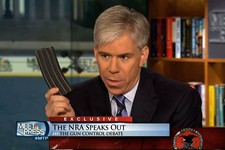  - 
              This image made from video provided by NBC's "Meet the Press" shows host David Gregory holding what he described as a high-capacity ammunition magazine during the taping of the Sunday, 