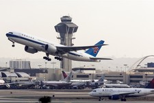  - 
              A China Southern Cargo jet takes off at LAX International airport in Los Angeles Monday, April 22, 2013. Some fliers headed to Los Angeles International Airport were met with delays yes