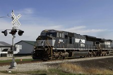  - 
              In this Tuesday, Oct. 9, 2012, photo, a Norfolk Southern Railroad train pulls transport cars full of coal near Goodfield, Ill. Norfolk Southern Corp. reports quarterly financial results