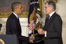  - 
              President Barack Obama shakes hands with his nominee for Federal Housing Finance Authority (FHFA), Tom Wheeler, in the State Dining Room of the White House in Washington, Wednesday, May