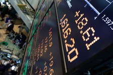  - 
              A board overlooking the floor of the New York Stock Exchange shows an intraday number above 1,600 for the S&P 500, Friday, May 3, 2013. A big gain in the job market is lifting the stock
