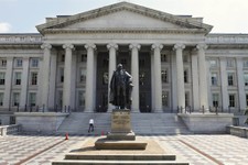  - 
              FILE - In this Aug. 8, 2011, file photo, a statue of former Treasury Secretary Albert Gallatin stands outside the Treasury Building in Washington. Absent a magic potion or explosive eco