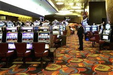  - 
              FILE - In this May 13, 2008 file photo, one of the slot machine rooms at the new MGM Grand Hotel stands ready for the start of business at the Foxwoods Resort Casino in Mashantucket, Co