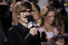  - 
              FILE - In this Friday, Jan. 14, 2011 file photo, Justin Beiber is seen interviewing on the red carpet at the 16th Annual Critics' Choice Movie Awards in Los Angeles. Dubai newspapers qu