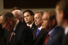  - 
              FILE - In this April 18, 2013 file photo, Sen. Marco Rubio, R-Fla., center, and others Senators, participate in a news conference on immigration on Capitol Hill in Washington. From left