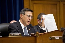  - 
              House Oversight Committee Chairman Rep. Darrell Issa, R-Calif., displays a letter of praise from President Obama to Gregory Hicks, former deputy chief of mission in Libya, number two in