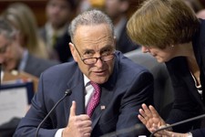  - 
              Sen. Chuck Schumer, D-N.Y., left, confers with Sen. Amy Klobuchar, D-Minn., as the Senate Judiciary Committee meets on immigration reform on Capitol Hill in Washington, Thursday, May 9,