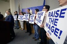  - 
              FILE - In this April 29, 2013, file photo Lyle Cafe owner Barbara Johnson of Winthrop, Minn., speaks in support of a bill to raise Minnesota's minimum wage during a news conference at t