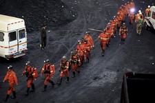  - 
              In this Saturday, May 11, 2013 photo, rescuers prepare to enter the Dashan Coal Mine for rescue operation in Pingba county in southwest China's Guizhou province. Authorities say 40 mine
