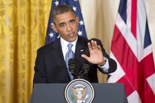  - 
              President Barack Obama gestures during a joint news conference with British Prime Minister David Cameron, Monday, May 13, 2013, in the East Room of the White House in Washington, where 