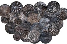  - 
              In this undated image made available on Thursday May 16, 2013 show coins from   Bohemia, Germany, Denmark and England discovered during an archaeological dig last year   Danish museum o