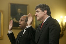  - 
              Ousted IRS chief Steve Miller, right, and J. Russell George, Treasury Inspector General for Tax Administration, are sworn in on Capitol Hill, in Washington, Friday, May 17, 2013, prior 