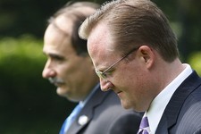  - 
              FILE - In this Aug. 11, 2009, file photo Senior White House Adviser David Axelrod, left, White House Press Secretary Robert Gibbs, right, leave with President Barack Obama, not shown, f
