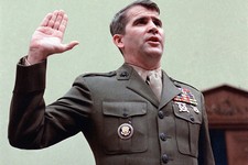  - 
              FILE - In this Dec. 18, 1986 file photo, Oliver North is sworn in on Capitol Hill in Washington prior to testifying before the House Foreign Affairs  Committee. Lois Lerner of the IRS j