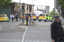  - 
              A tent is erected near the scene of an attack in Woolwich southeast  London Wednesday, May, 22, 2013. British officials said one person has died and at least two people have been wounde