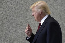  - 
              FILE - In this May 14, 2013 file photo, Donald Trump arrives at federal court  in Chicago to testify at a civil trial where he is accused of cheating an 87-year-old Jacqueline Goldberg 
