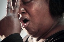  - 
              Author and social activist Sister Souljah gestures as she speaks during a memorial service for Malcolm Latif Shabazz at First Corinthian Baptist Church on Thursday, May 30, 2013 in the 