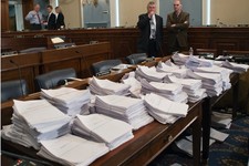  - 
              FILE - This May 15, 2103 file photo shows stacks of paperwork prepared for members of House Agriculture Committee, who are meeting on Capitol Hill in Washington. This week the Senate re