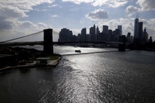  - 
              The skyline of lower Manhattan in seen past the East River in New York, Tuesday, June 11, 2013. The projections paint an unsettling picture of New York's future: a city where by the 205