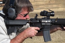  - 
              In this Tuesday, Feb. 5, 2013 photo, a shell is ejected as Frankie McRae fires an AR-15 semiautomatic rifle at his Range 37 gun club in Bunnlevel, N.C. McRae says U.S. Sen. Dianne Feins