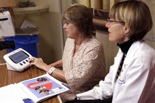  - 
              This photo taken Jan. 30, 2013 shows adult nurse practitioner Jayne Mitchell watching at right as patient Marlena Bechtel-Rysdam, from Elgin, Ore., practices using an electronic monitor