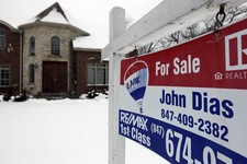  - 
              In this Wednesday, Feb. 27, 2013, photo, a "for sale" sign is seen outside a home in Glenview, Ill., Average U.S. rates on fixed mortgages moved closer to historic lows this week, a tre