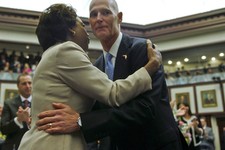  - 
              In this Tuesday, March 5, 2013 file photo, Florida Lt. Gov. Jennifer Carroll and Gov. Rick Scott embrace prior to his State of the State speech in the Florida House of Representatives i