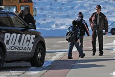  - 
              A Minnesota State Patrol officer escorts students into New Prague Middle School in New Prague, Minn., Wednesday, March 20, 2013 after  authorities in New Prague responded to a 911 call 