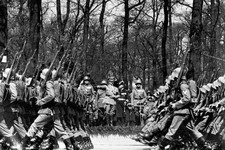  - 
              In this April 20, 1936 file photo, armed troops march past German Chancellor Adolf Hitler during a parade in Berlin to celebrate his birthday. As the Nazis increasingly targeted Jews an