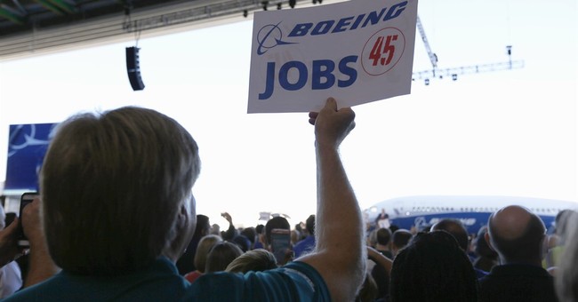 Trump's Boeing speech shows differences with Obama