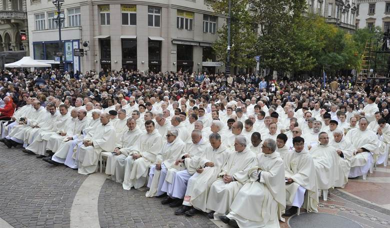 Priest Returns From China -- Has Mass Blocked by US Government