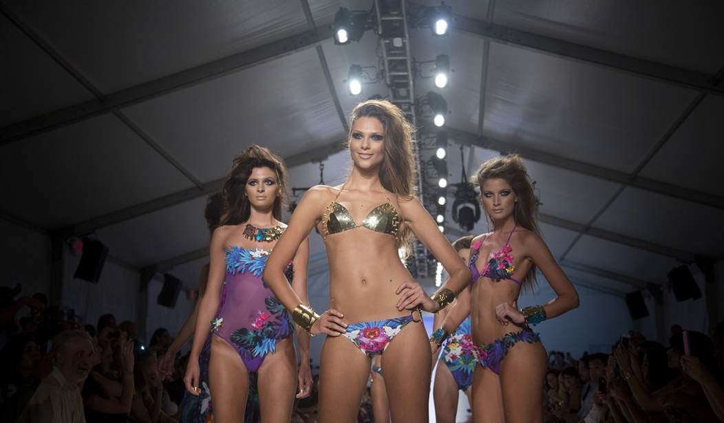 Australian bikini brand shuts down criticism over male model in