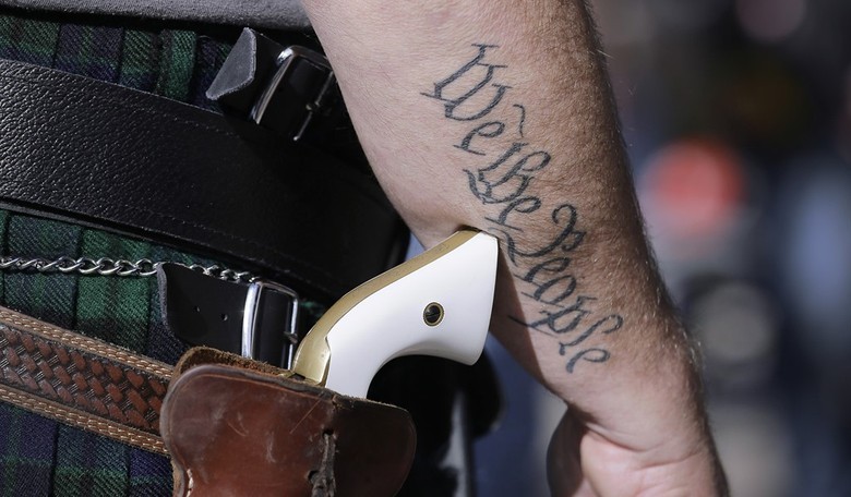 Mississippi Governor Signs Bill Allowing Guns in Churches