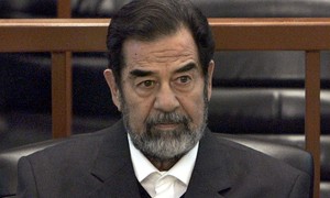 Michigan Senate Hopeful’s Dad on Board of Charity That Funded Saddam Hussein