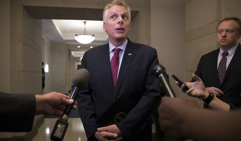 Gov. McAuliffe Pledges to Free Refugees Detained at Dulles Airport