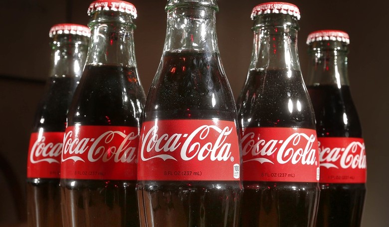 Moore to the Point - I'd Like to Buy the World a Coke
