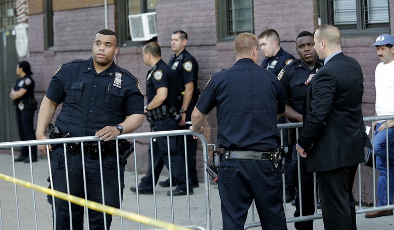 NYPD Cop Assassinated in Patrol Vehicle 