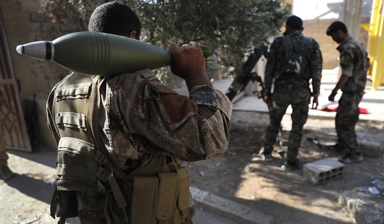 Syrian Forces Hold Almost Half of ISIS 'Capital'