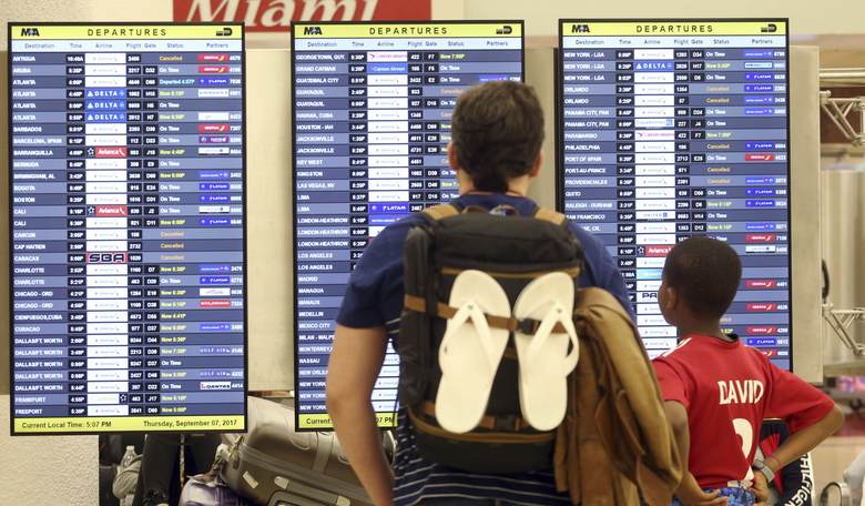 Did You Notice the Sign Behind the Massive Brawl at Miami International Airport?