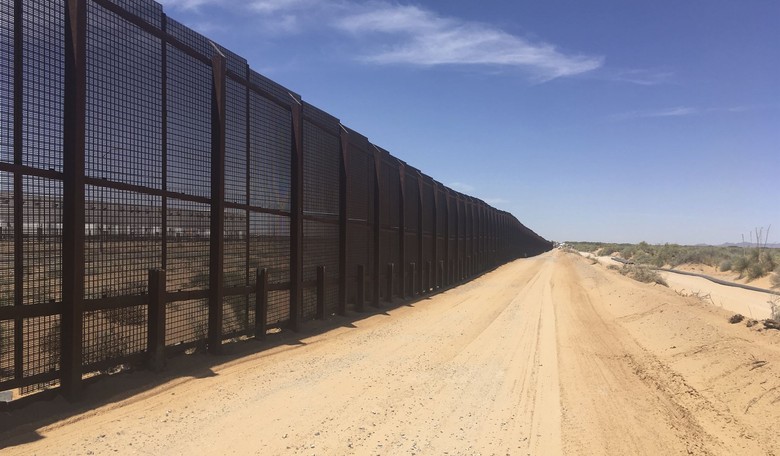 Rod Impales Illegal Alien Attempting to Climb the Border Wall With Her Kids