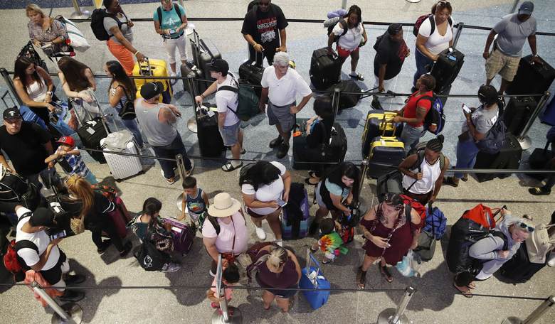 WATCH: Air Travelers Stop What They're Doing to Sing the National Anthem to Gold Star Families