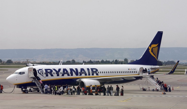 Happy Wife, Happy Life: Woman Hangs on to Husband As He's Sucked Halfway Out Airplane Window
