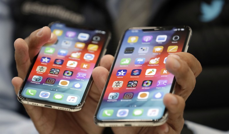 Workers Making Apple IPhones Start at $3.15 Per Hour -- in China