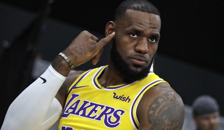 LeBron James Sits During National Anthem to Avoid Causing a 'Massive Stir.' Controversy or No?
